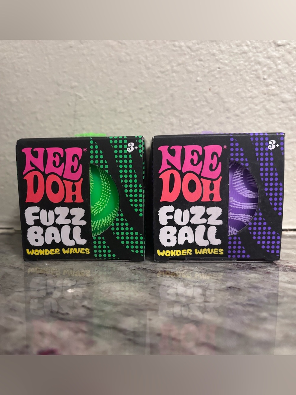 NeeDoh Fuzz Ball Wonder Waves - Green & Purple Squishy’s